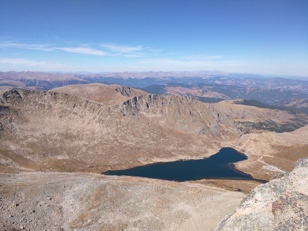 brown mountain under blue sky