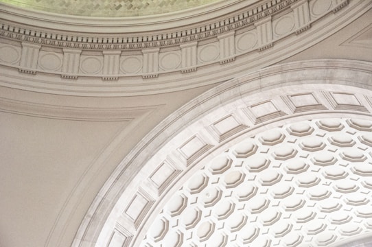 An elegant ceiling design featuring intricate gypsum board patterns.