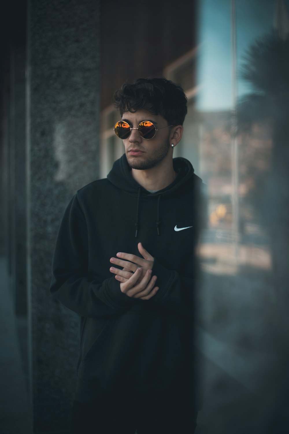 Man black pullover hoodie photo – Free Glasses Image Unsplash