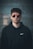 man standing wearing black Nike hoodie