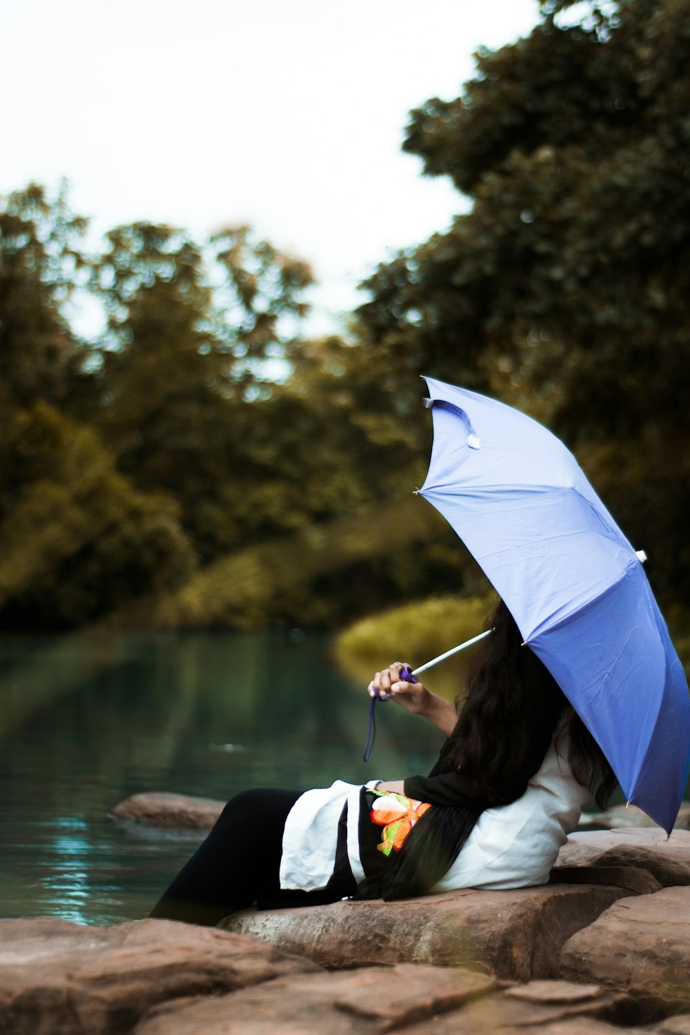 woman with a purple umbrella