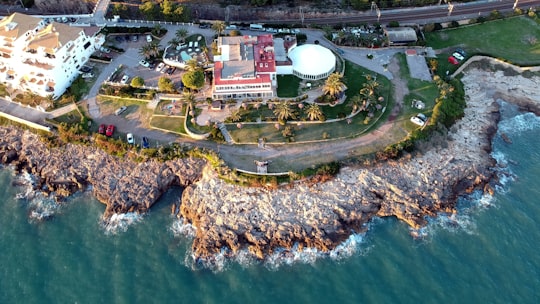 aerial photography of buildings near beach during daytime in helipuerto Spain