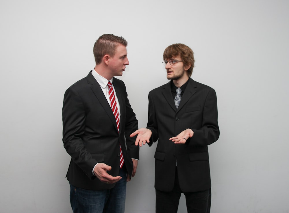 man wearing black suit jacket