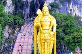 Batu Caves in Kuala Lumpur golden Buddha statue during daytime