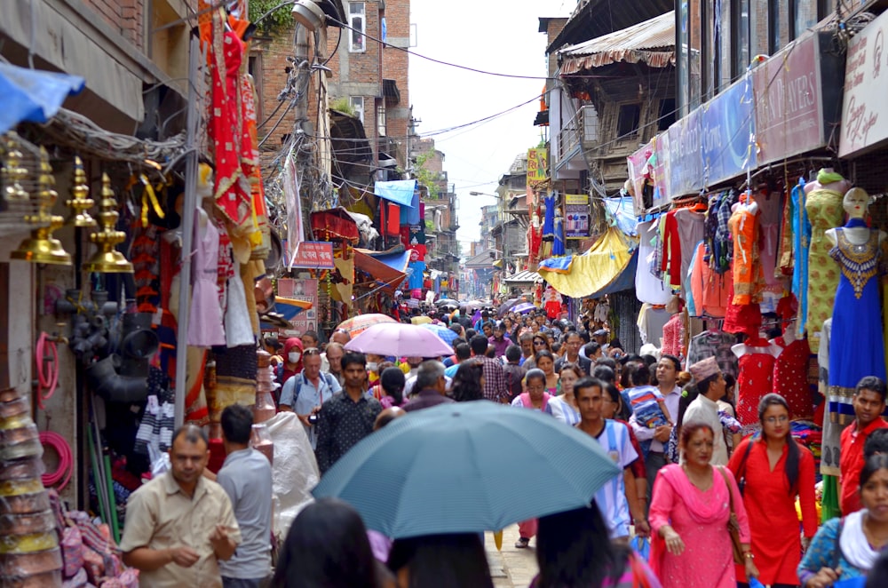 people walking on market during daytime