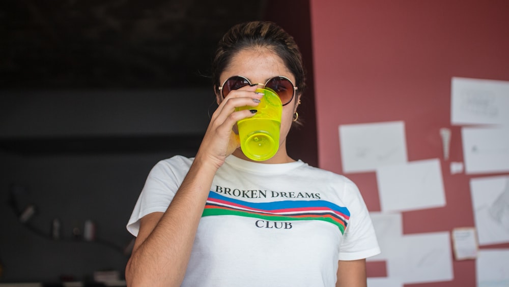 woman wearing white crew-neck shirt