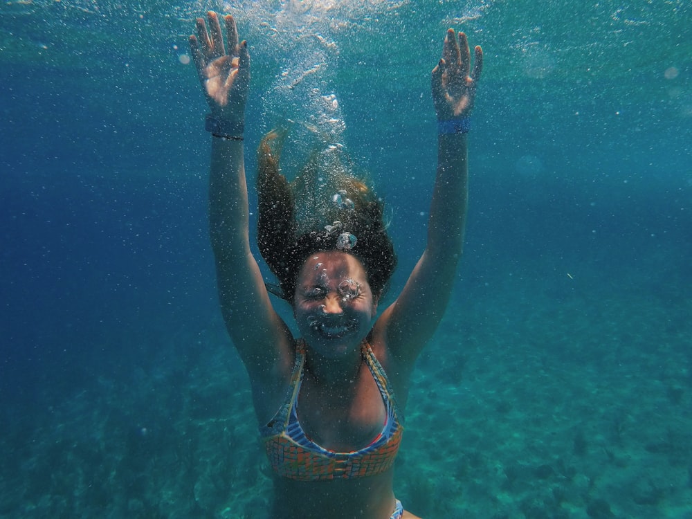 Woman wearing bikini in beach photo – Free Water Image on Unsplash
