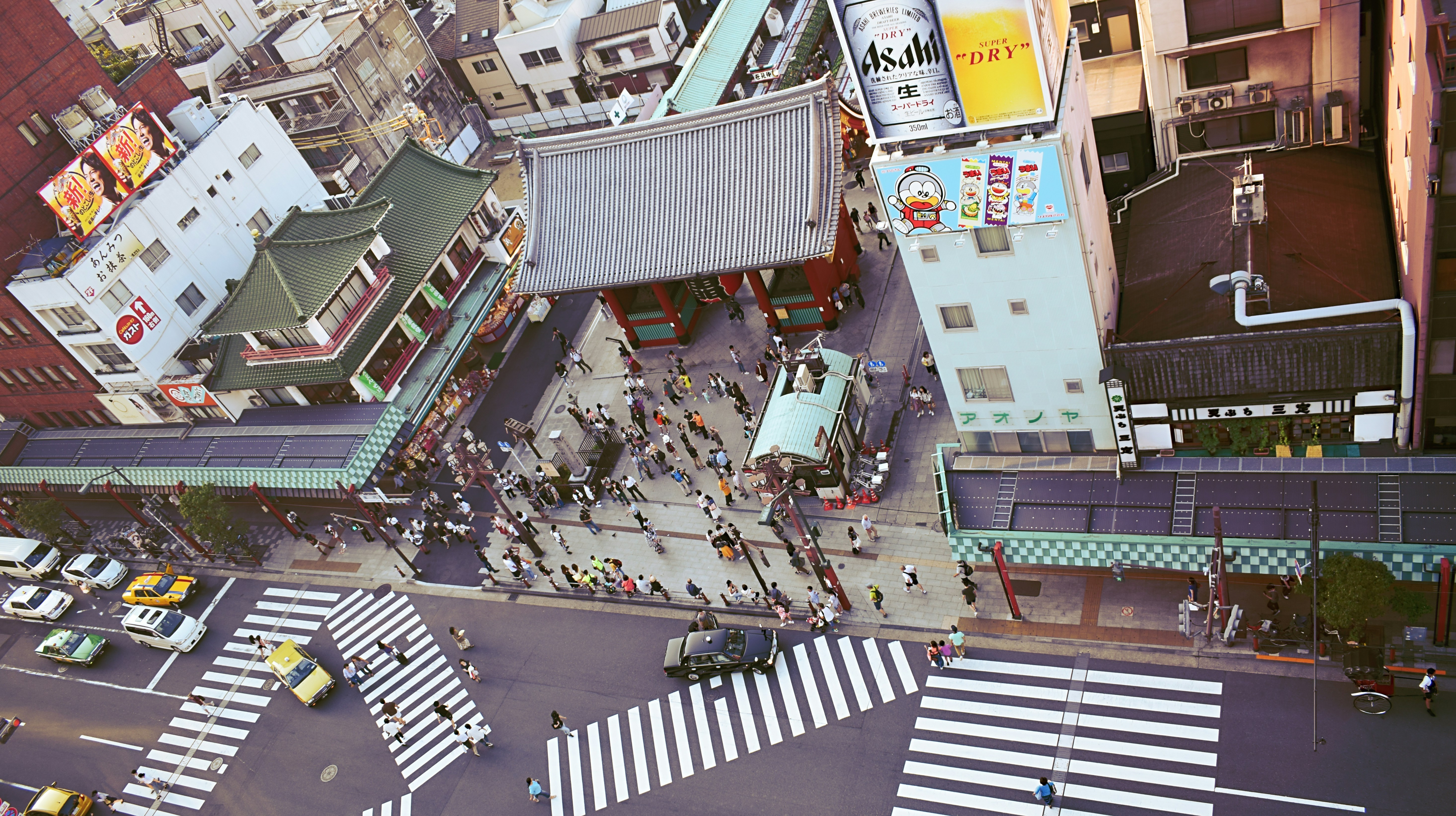 People practicing drop, cover, hold on during earthquake drill in Japan