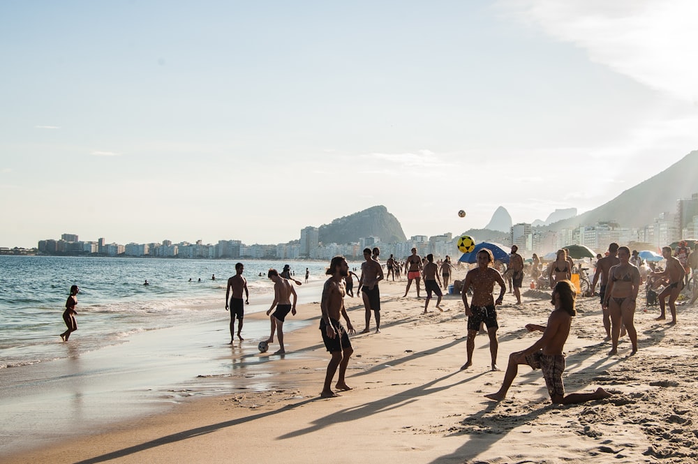 crowd of people on beach during daytime