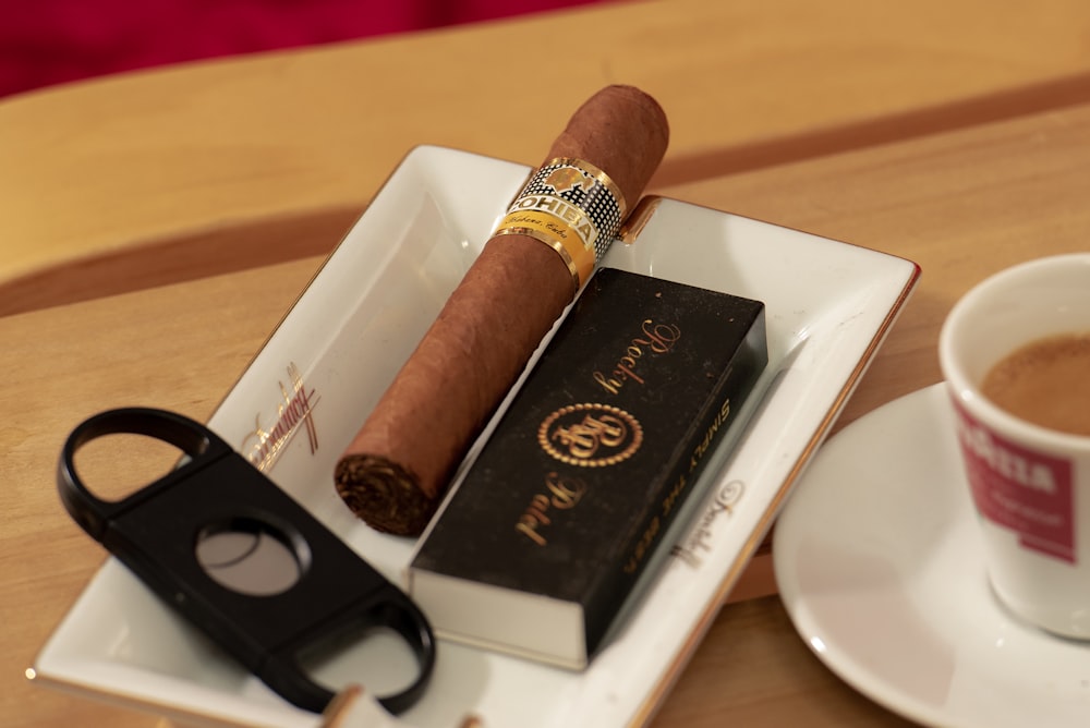 brown cigar on tray