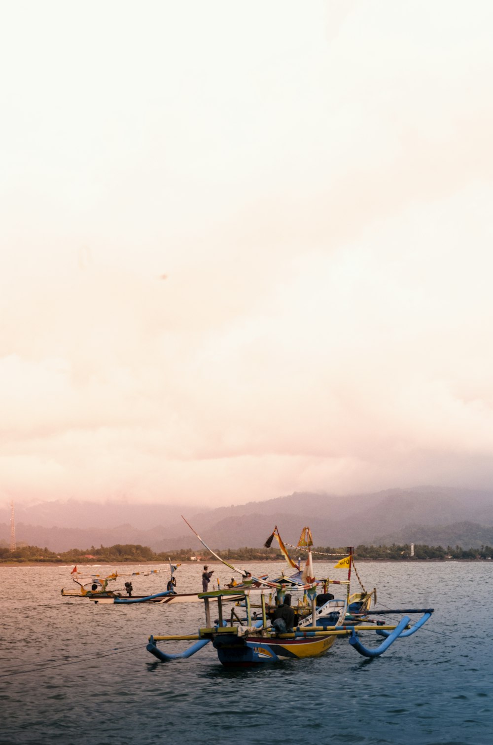 boats on water during golden hour