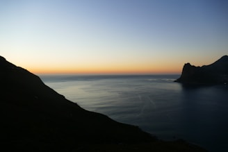 A serene view of the Mediterranean coastline near Tel Aviv at dusk.