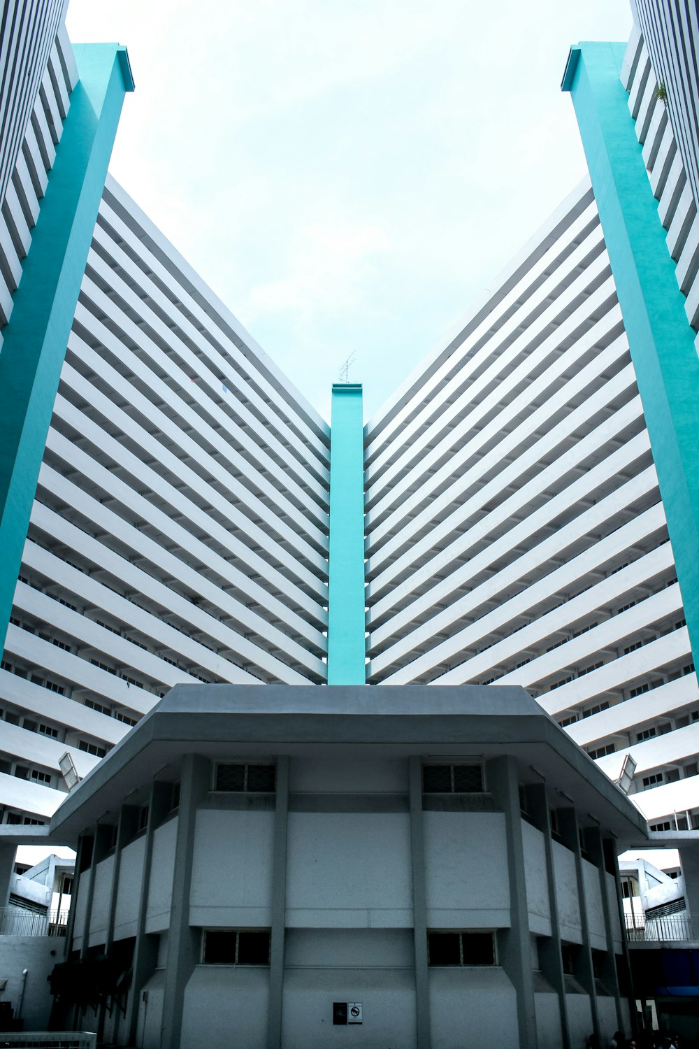 white concrete building under white sky