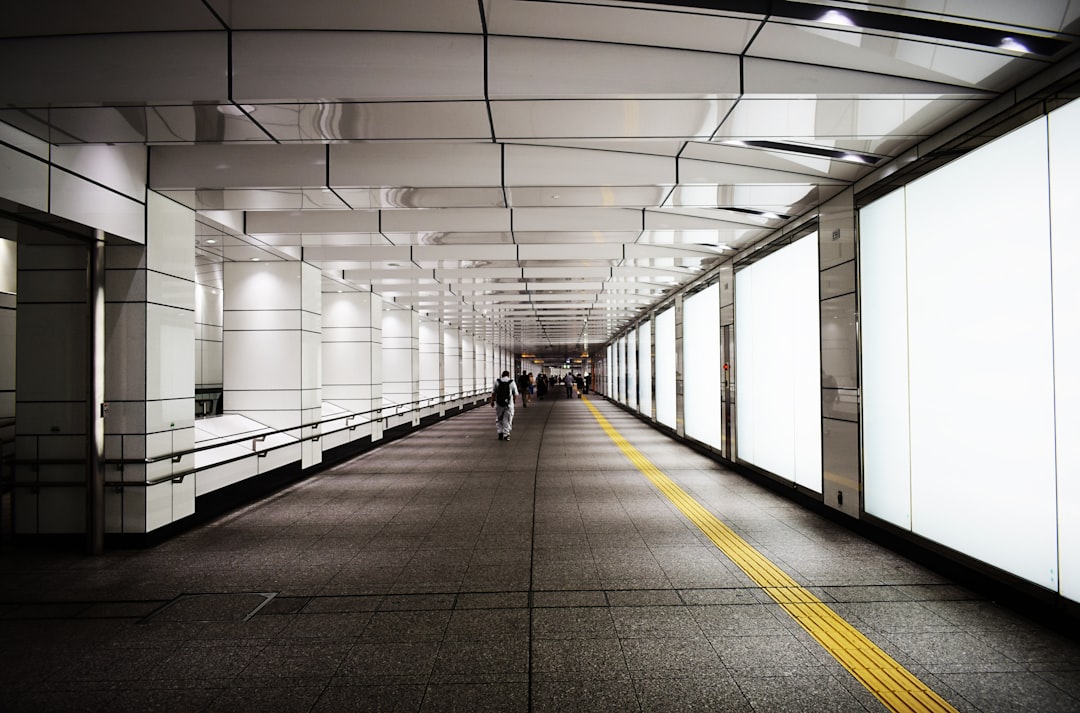 people walking down the subway