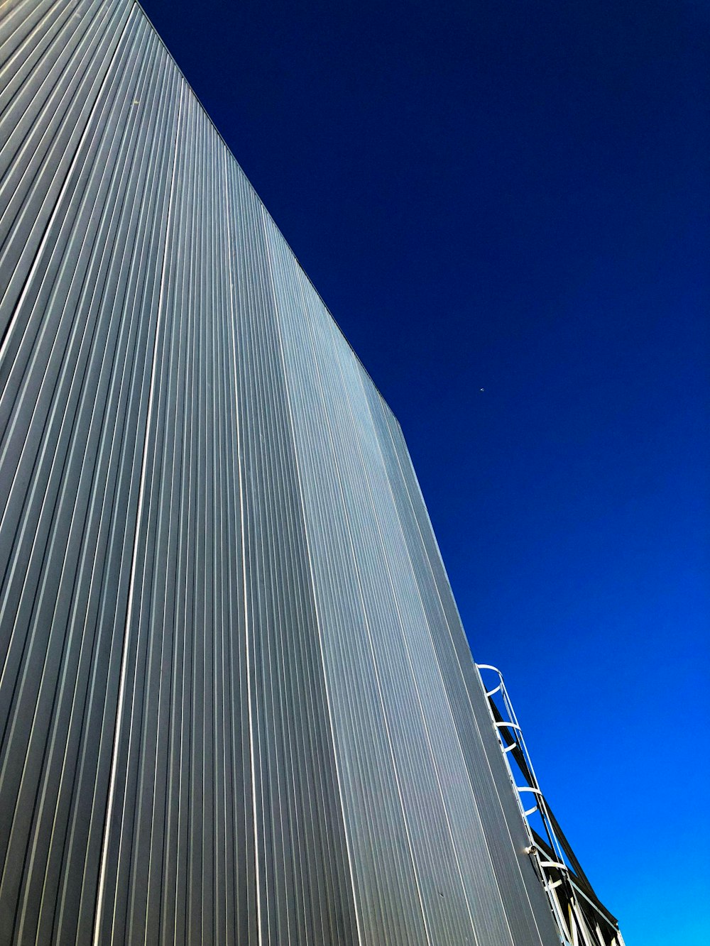 low-angle view of building under blue sky during daytime