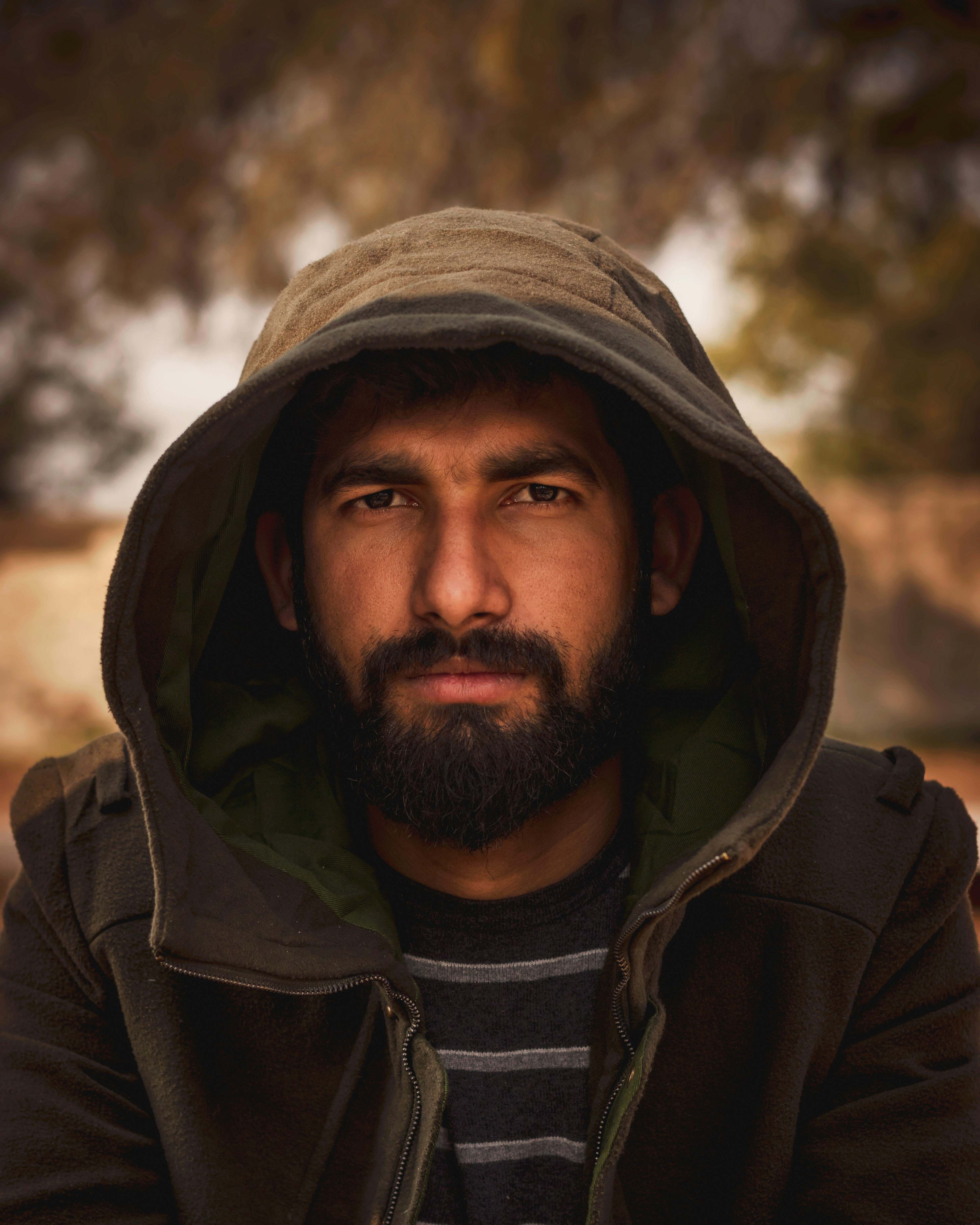 wearing a hoodie with a hooded jacket