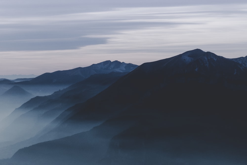 silhouette of mountain ranges during daytime