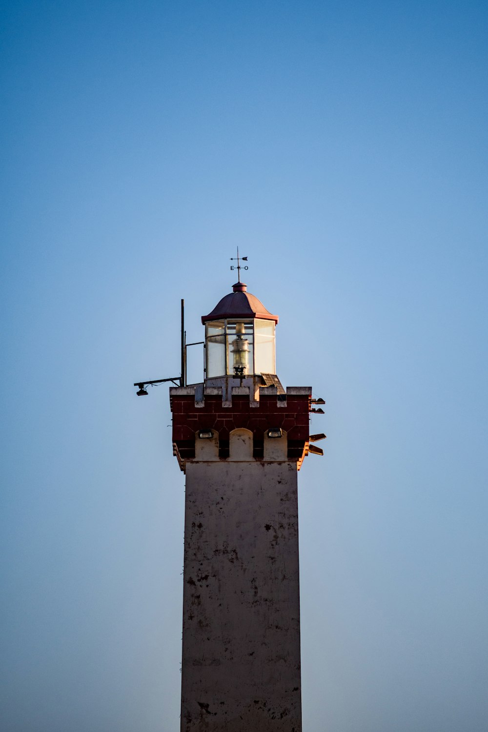 lighthouse under blue sky