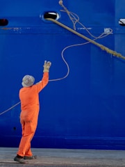 man throwing rope