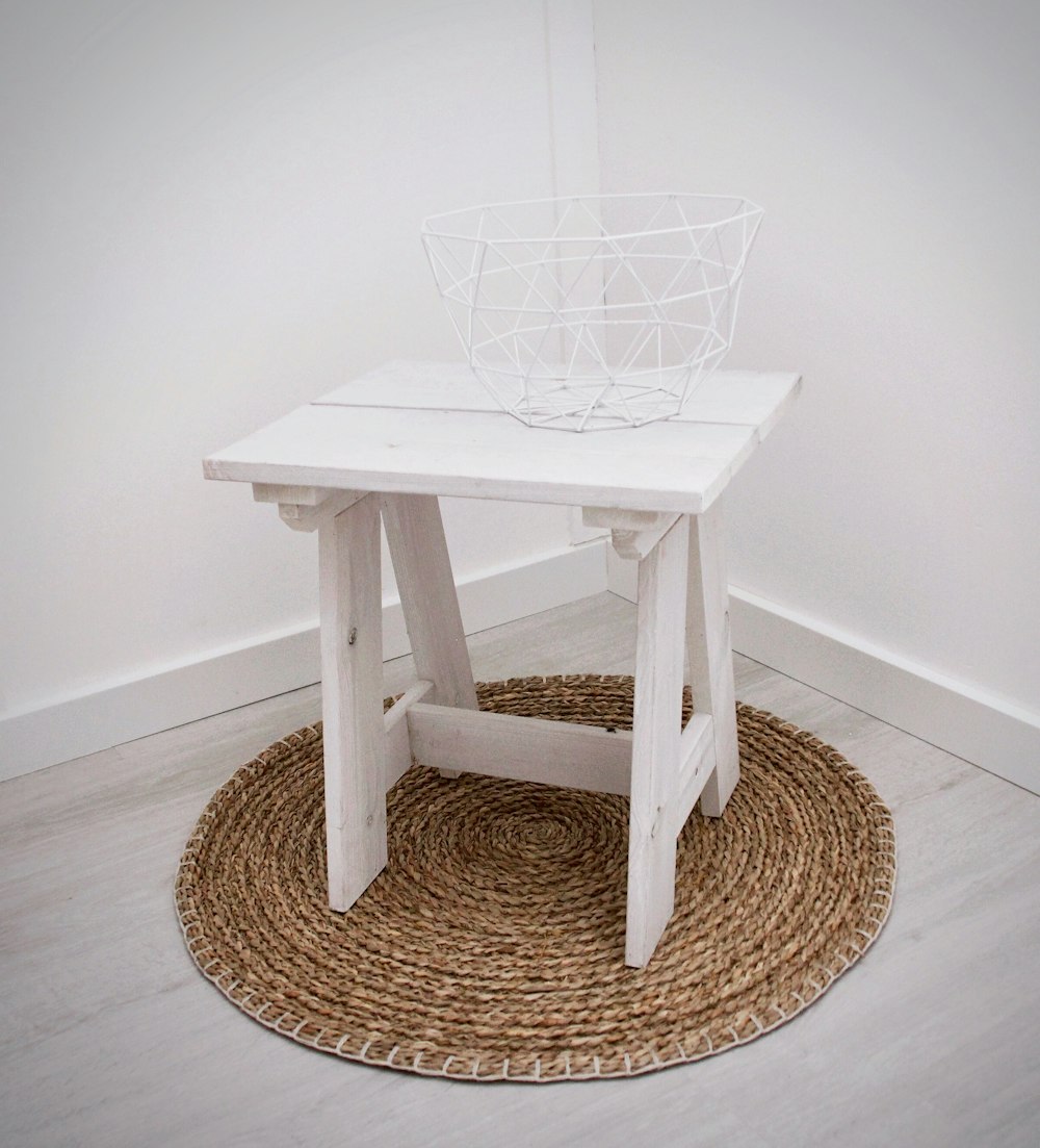 white metal basket on table