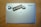 A close-up of a beautifully designed sticker on a laptop.