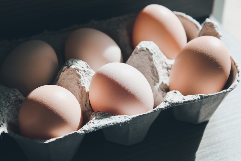 six eggs on tray