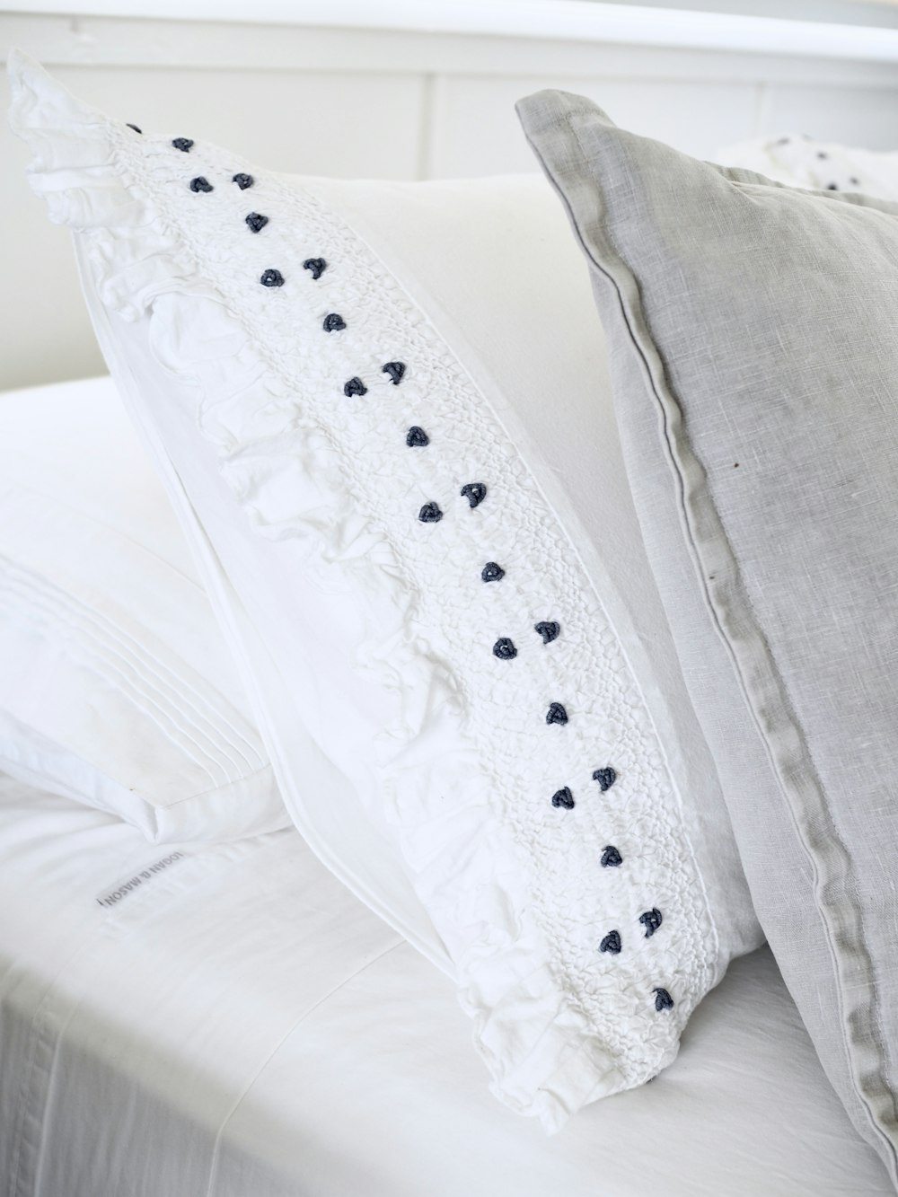 white and grey pillows