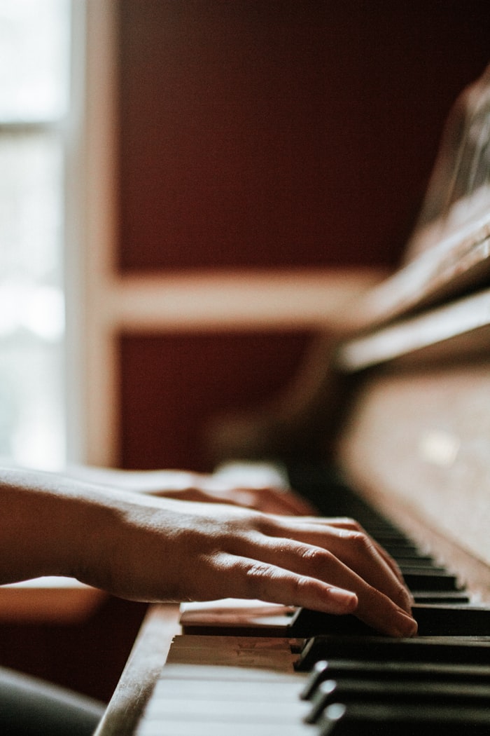 Student at the piano during a group lesson