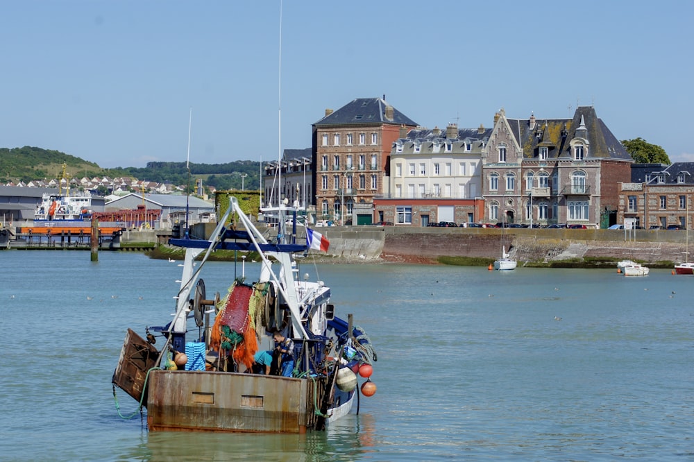 people riding on boat during daytime