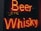 Neon signage displays the words Beer and Whisky in bright red against a dark background.