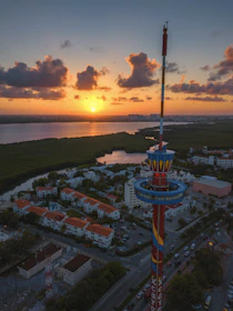 red and blue metal tower during golden hour
