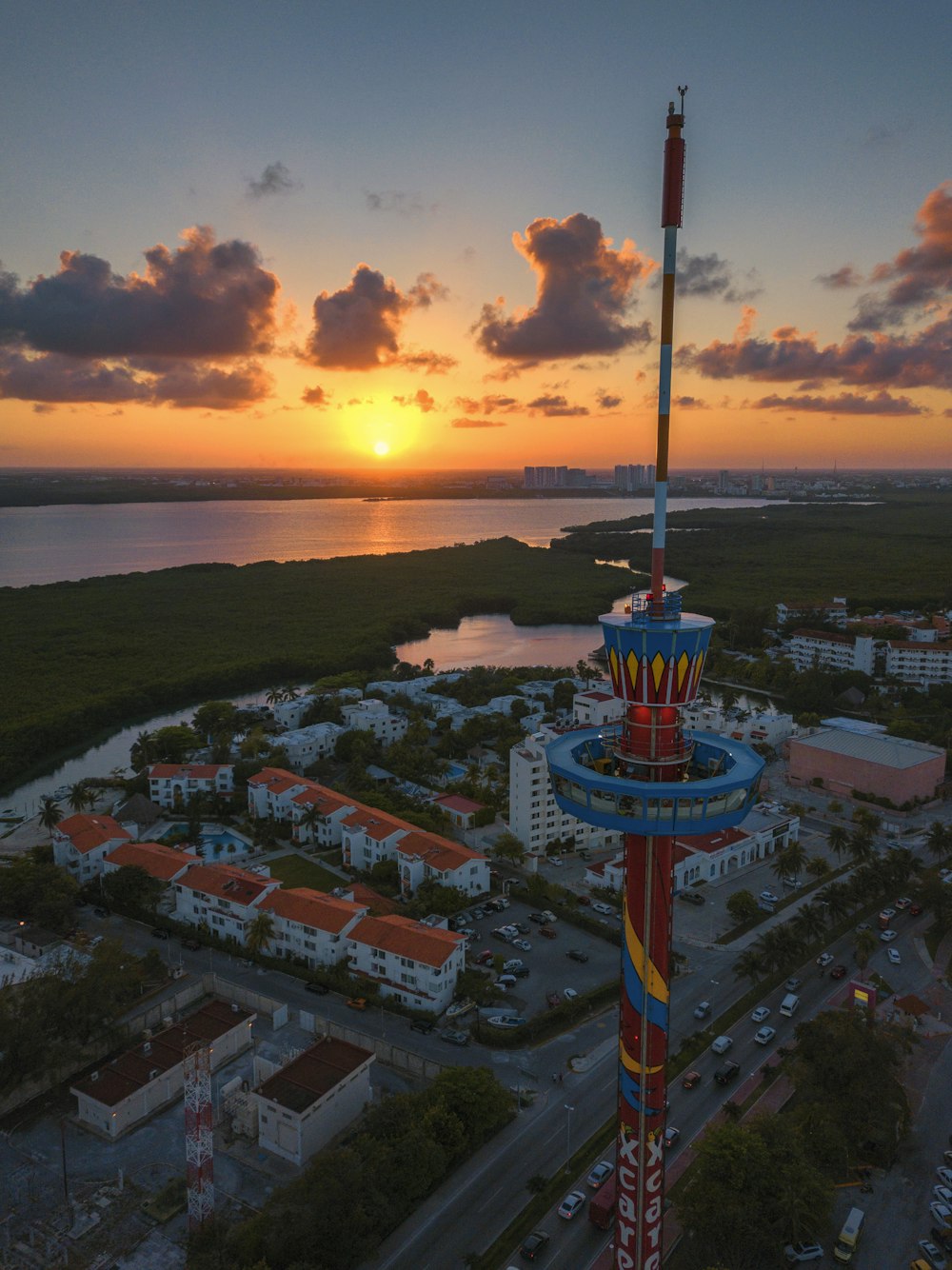 red and blue metal tower during golden hour