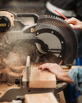 black and gray DEWALT miter saw