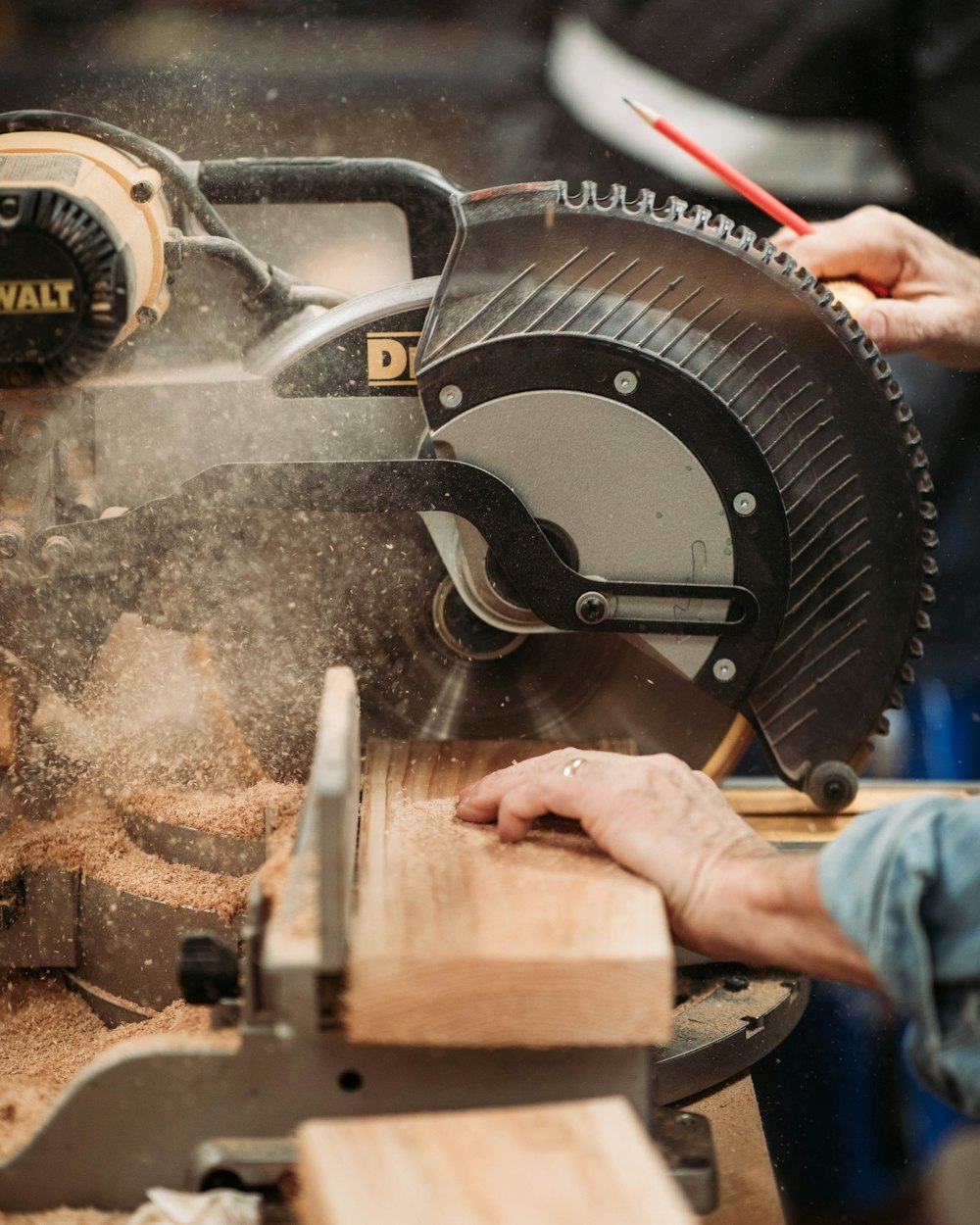 black and gray DEWALT miter saw