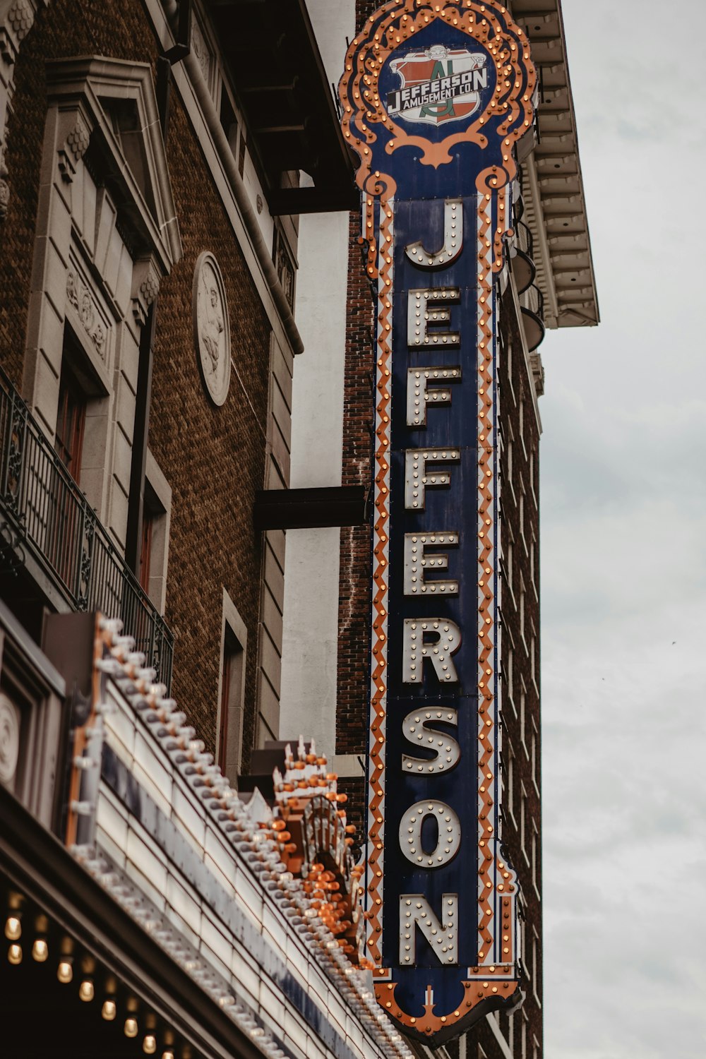 white and black Jefferson light signage during daytime