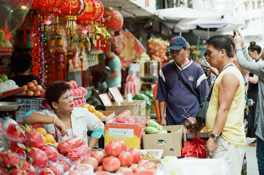 man standing in front of woman