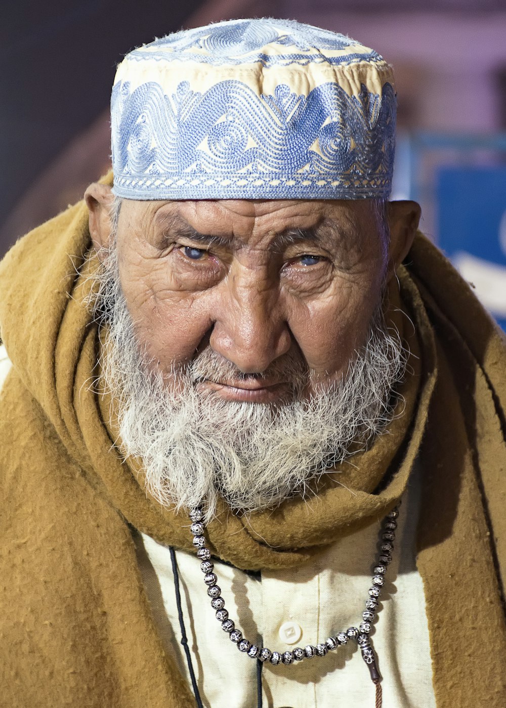 man wearing brown coat