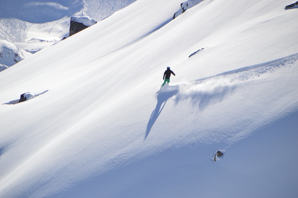 aerial photography of person snowboarding