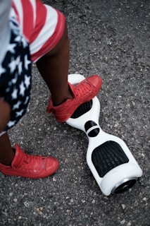 Urban commuters wearing hoverfoot shoes in a busy street.