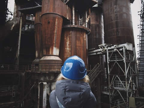 woman wearing blue hard hat