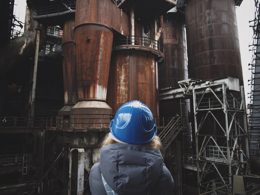 woman wearing blue hard hat