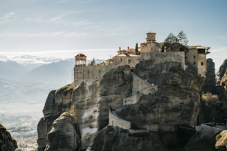 city on top of rock formation during daytime