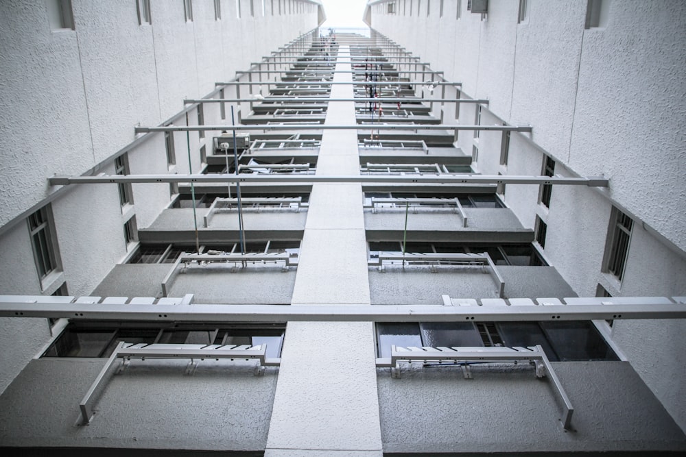 low-angle photography of concrete high rise building