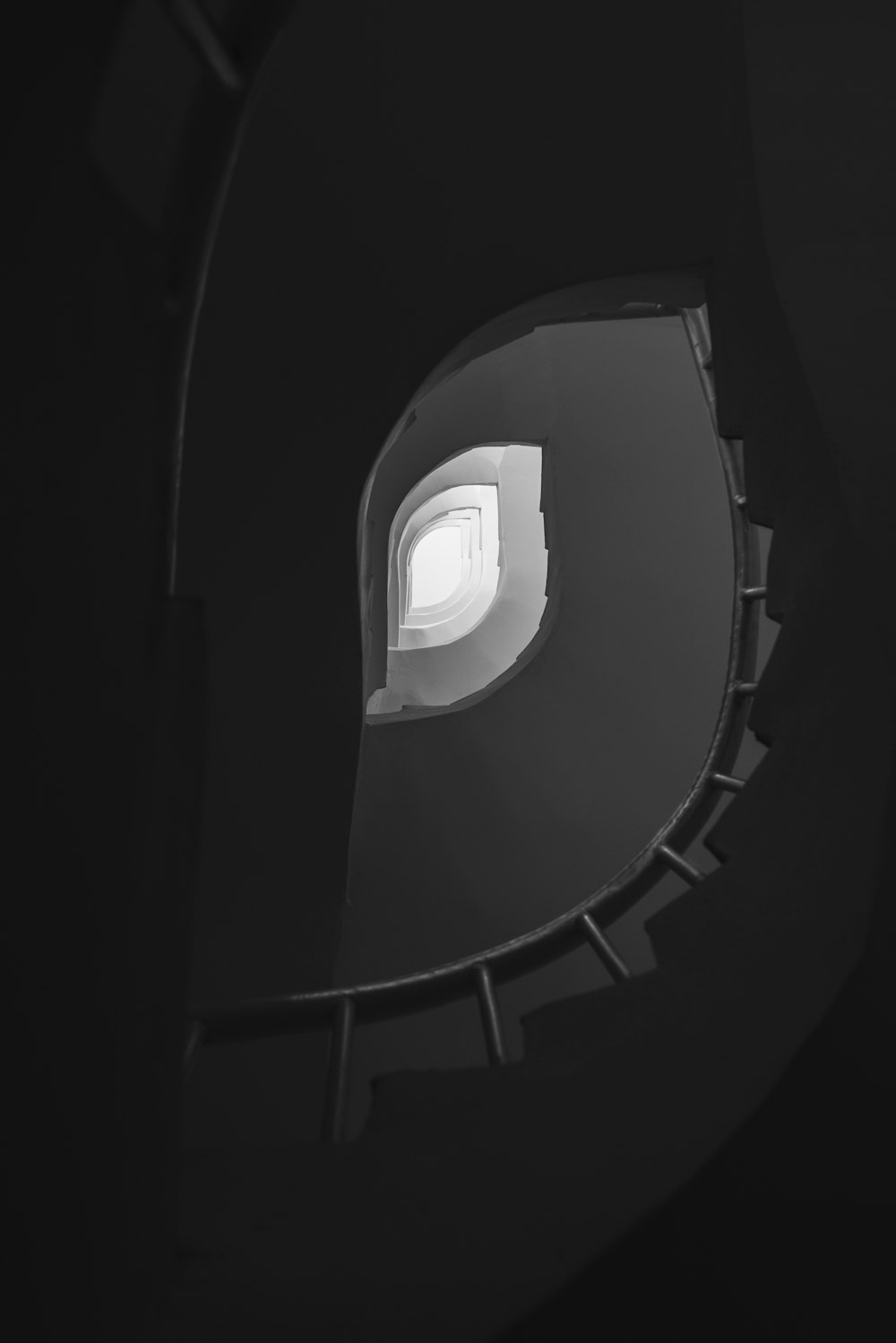 light on top of spiral staircase