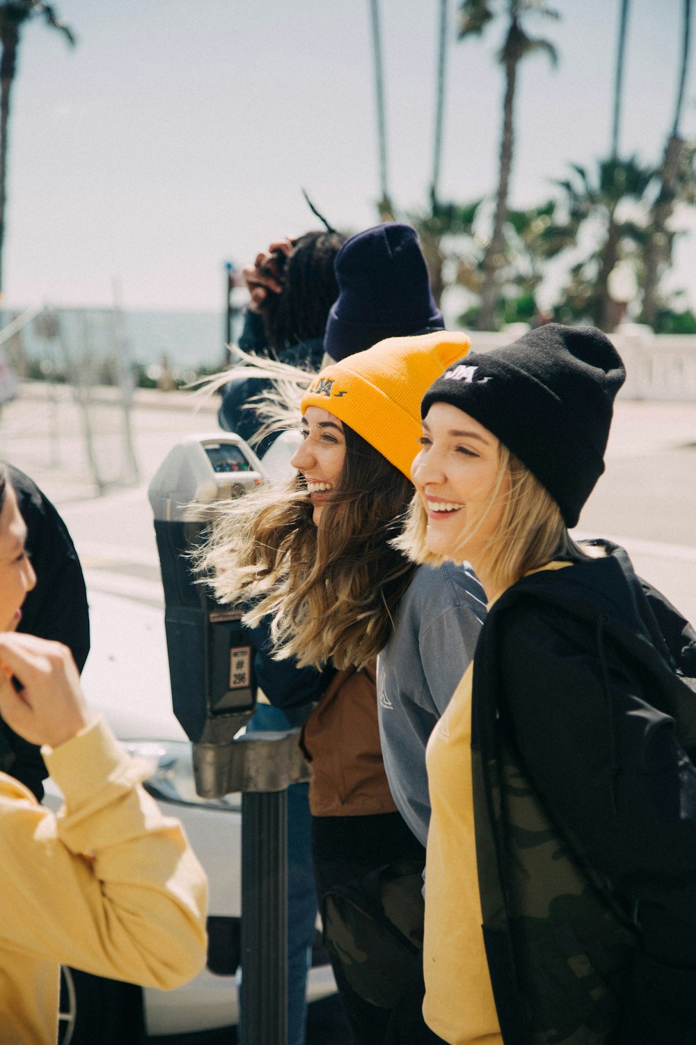 women laughing during daytime