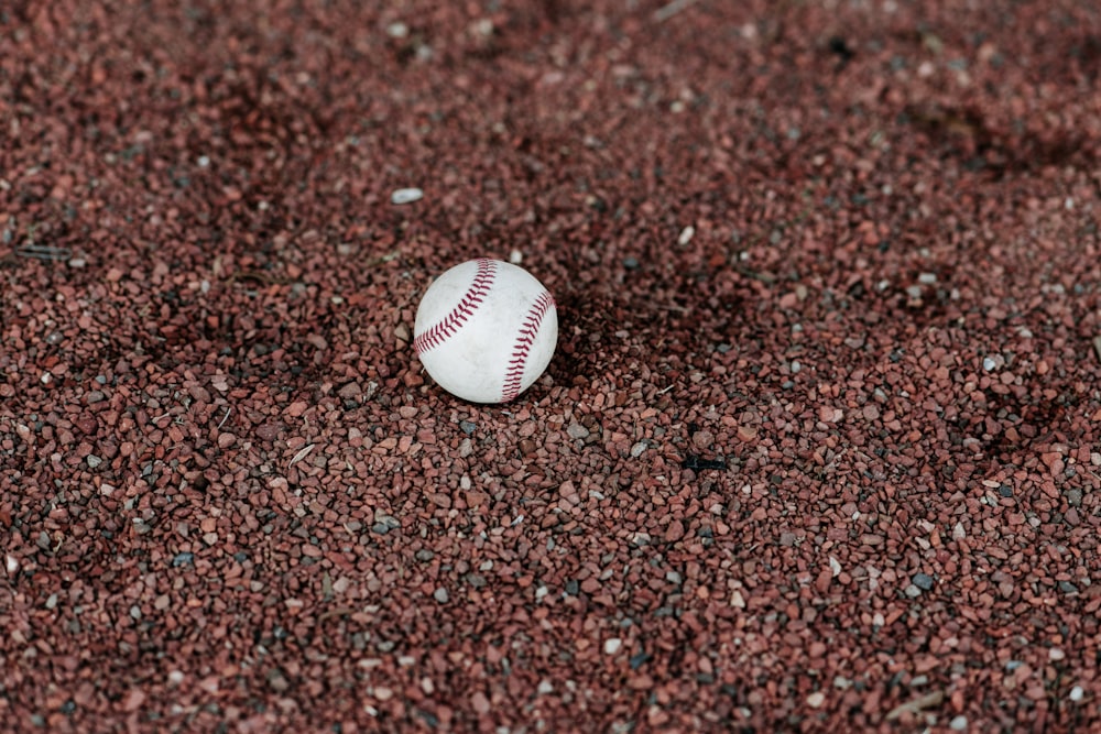 white baseball on ground