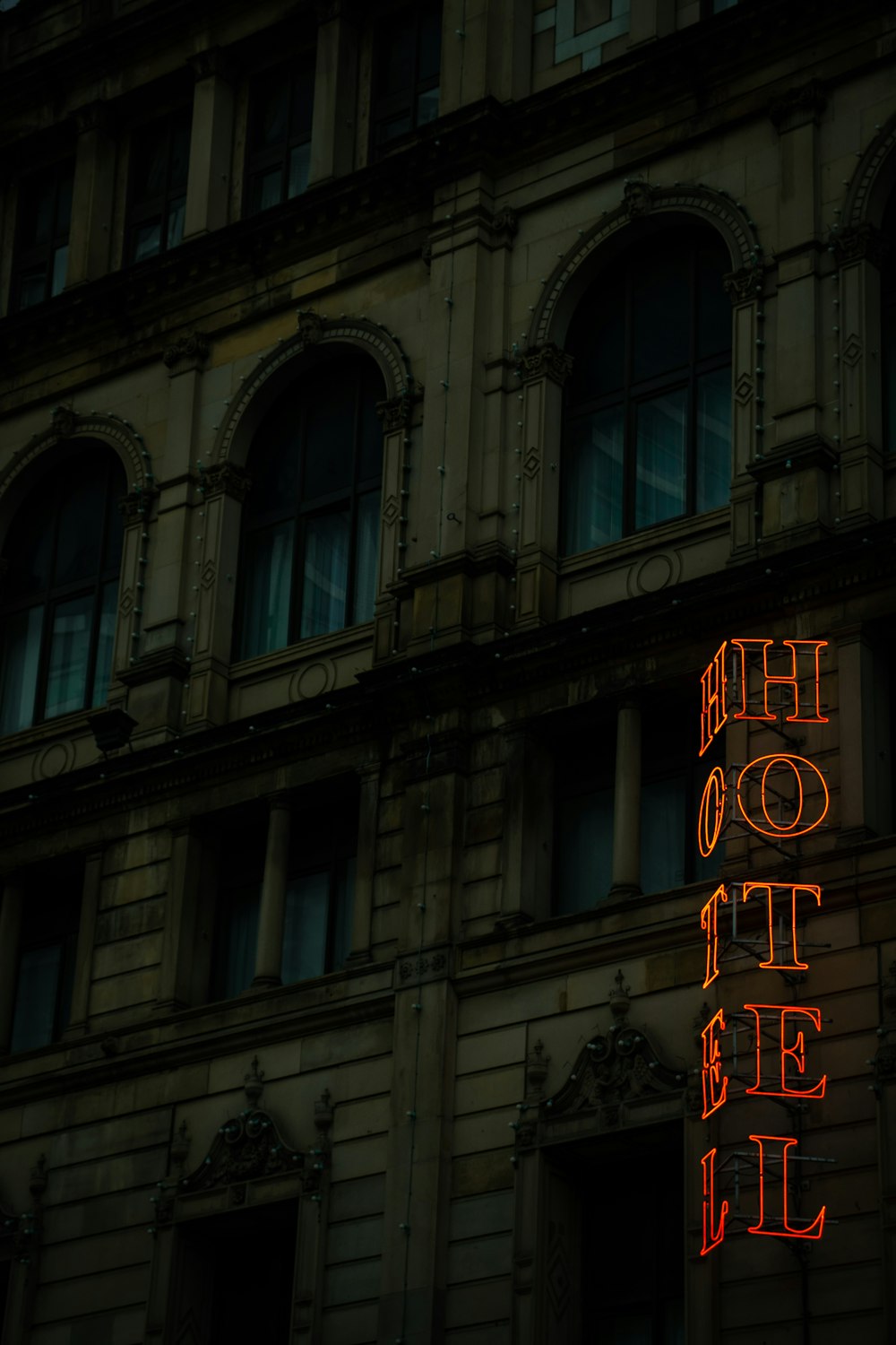 building with hotel light signage