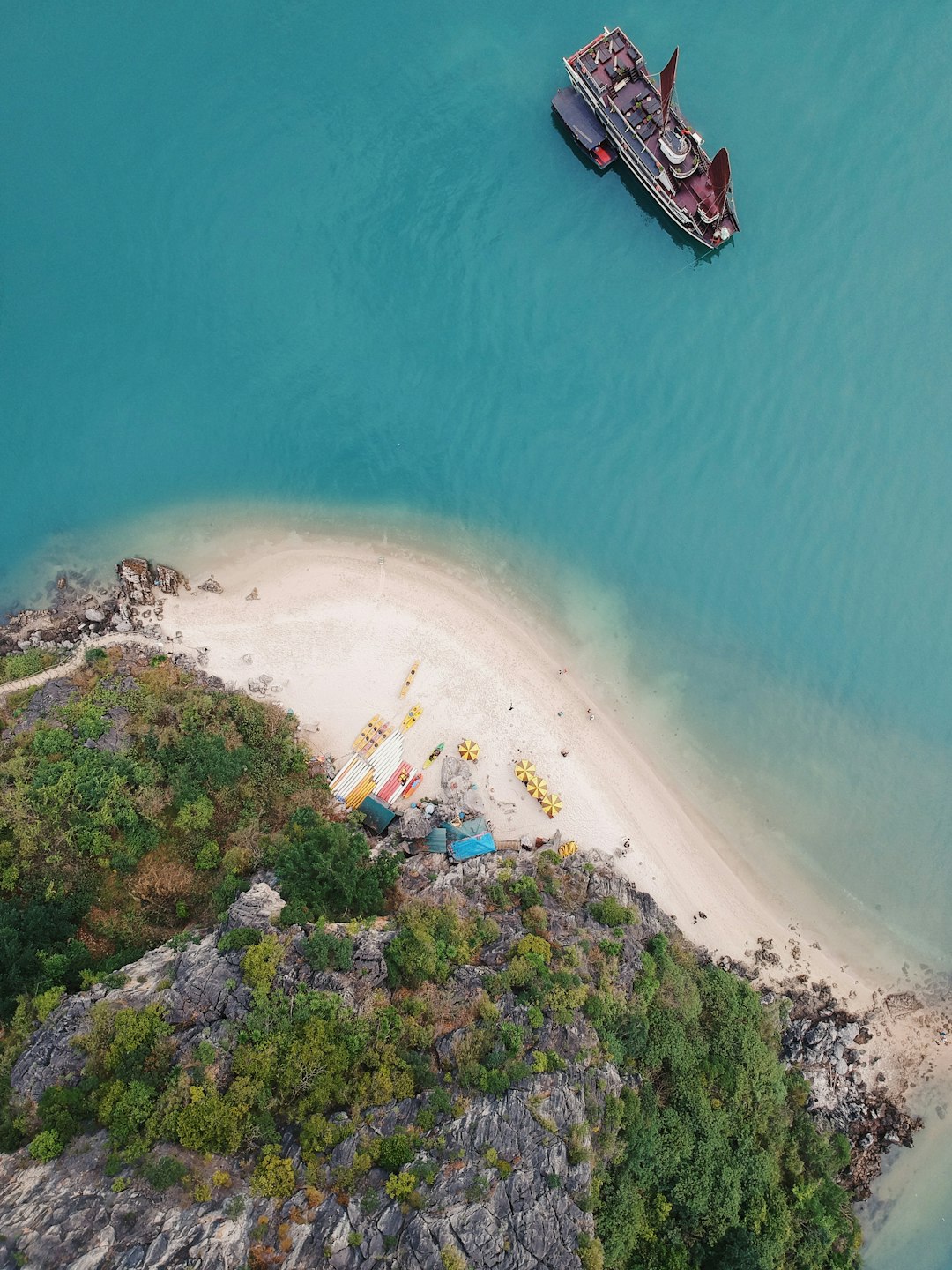 boat near seashore in aerial photography