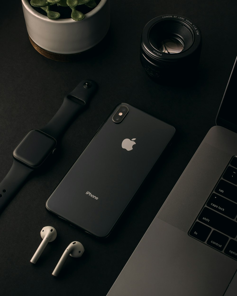space gray iPhone X and Apple watch