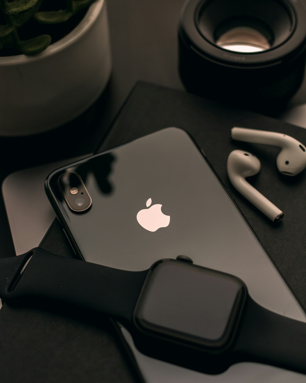 space black Apple Watch over black iPhone X